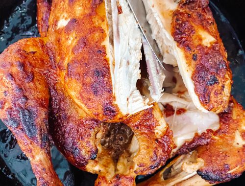 Photograph of Rotisserie Skillet Roast Chicken with Mashed Potatoes and Onion Gravy