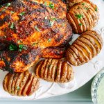 Skillet Roast Peri Peri Chicken with Coriander and Chilli Yoghurt and Hasselback Potatoes