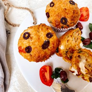 Photograph of Red Leicester and Feta Cheese Muffins with Semi-dried Tomatoes and Olives