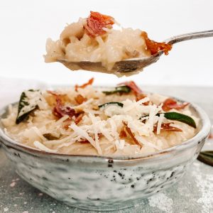 Photograph of Chicken Risotto with Crispy Sage and Prosciutto