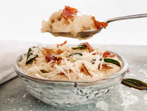 Photograph of Chicken Risotto with Crispy Sage and Prosciutto