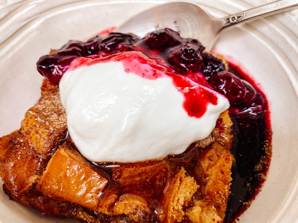 Photograph of Oven - Baked French Toast with Maple Syrup and Blueberry Sauce