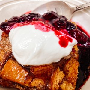 Photograph of Oven - Baked French Toast with Maple Syrup and Blueberry Sauce