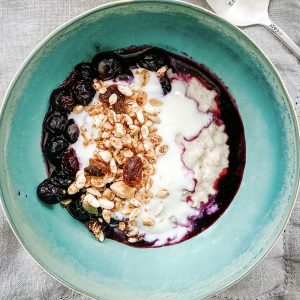 Photograph of Porridge with Blueberry Sauce, Yoghurt and Granola