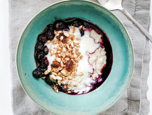 Photograph of Porridge with Blueberry Sauce, Yoghurt and Granola