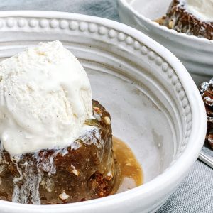 Photograph of Banana Sticky Toffee Pudding with Salted Caramel and Roast Pecan Sauce