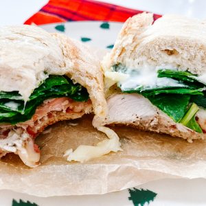 Photograph ofChicken, Brie, Cranberry and Chilli Sandwich with Spinach and Mayonnaise