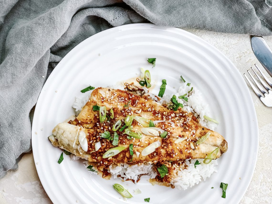 Photograph of Sea Bass with Asian Sauce, Spring Onions and Sesame