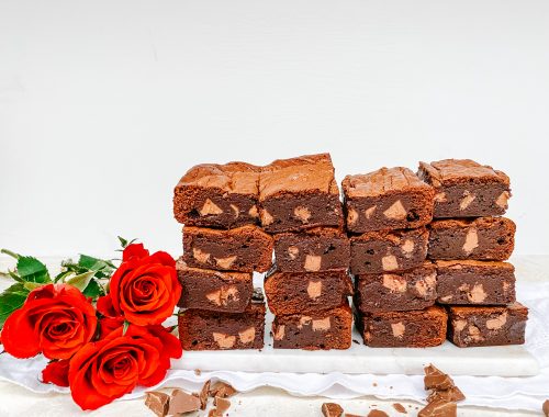 Photograph of Dark Chocolate Brownies with Chunks of Milk Chocolate