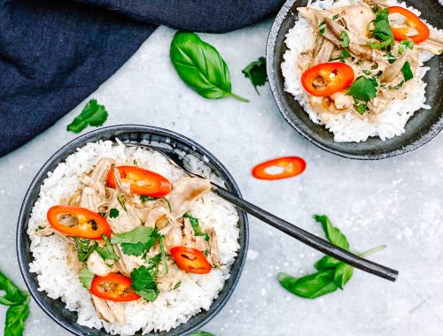 Photograph of Thai Red Curry with Duck, Lychees, Sweet Basil and Coriander Served with Jasmine Rice