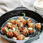 Photograph of Crab and Chicken Meatballs with a Honey, Soy and Garlic Sauce with Chilli and Lime