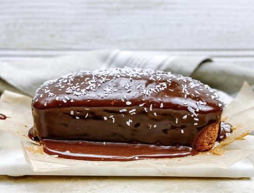 Photograph of Coconut Loaf Cake with Salted Milk Chocolate Ganache