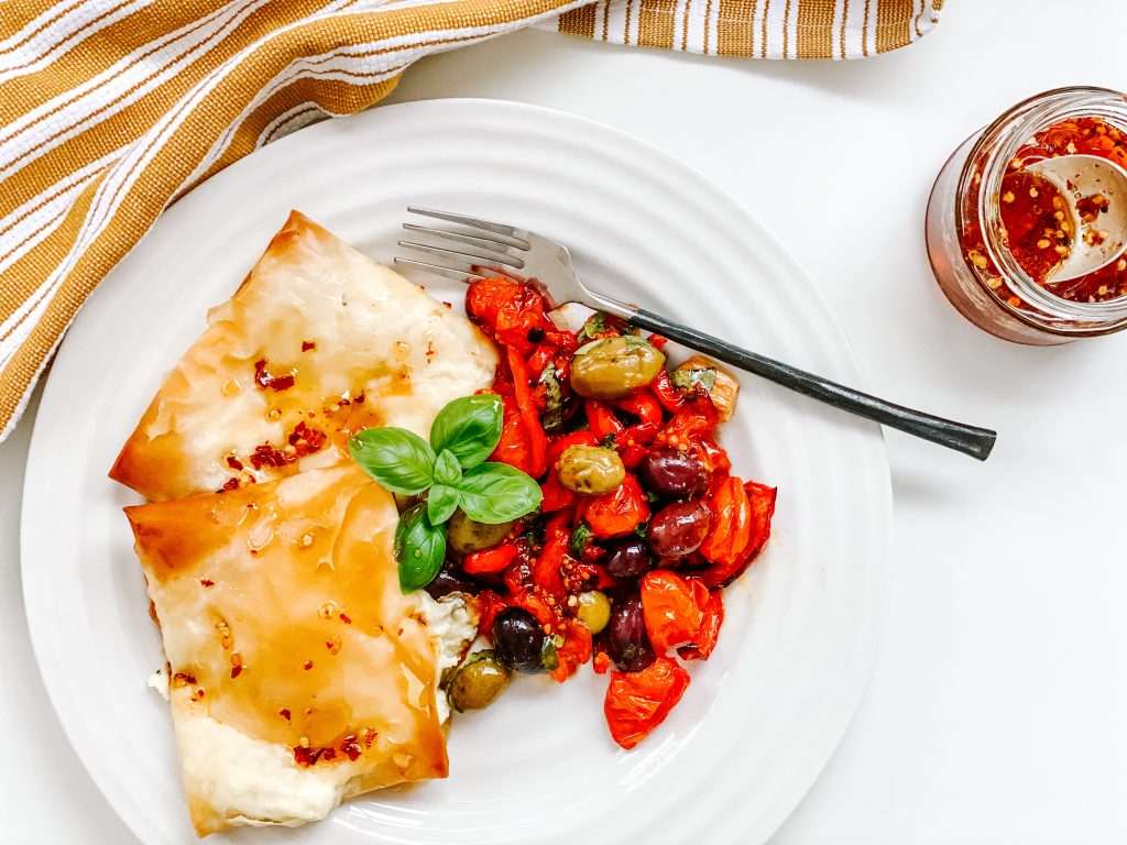 Photograph of Burrata cooked in Filo Pastry with Roast Vegetables and Hot Chilli Honey