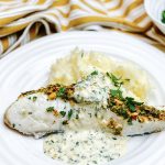 Halibut Fillets Coated with Crispy Pistachio and Served with a Creamy Lemon and Parsley Sauce