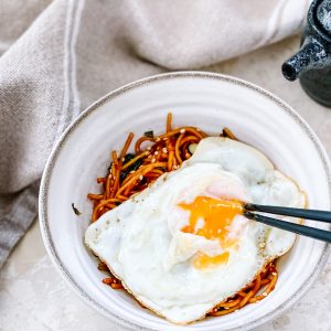 Photograph of Quick Indonesian Sesame Ginger Noodles with Fried Egg