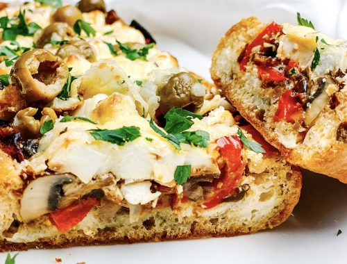 Photograph of Olive Ciabatta Loaded with Red Pepper, Mushrooms and Feta Cheese