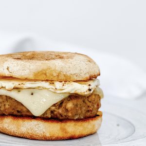 Photograph of 'Wimbledon Royals' Sausage and Egg English Muffin with Cheese