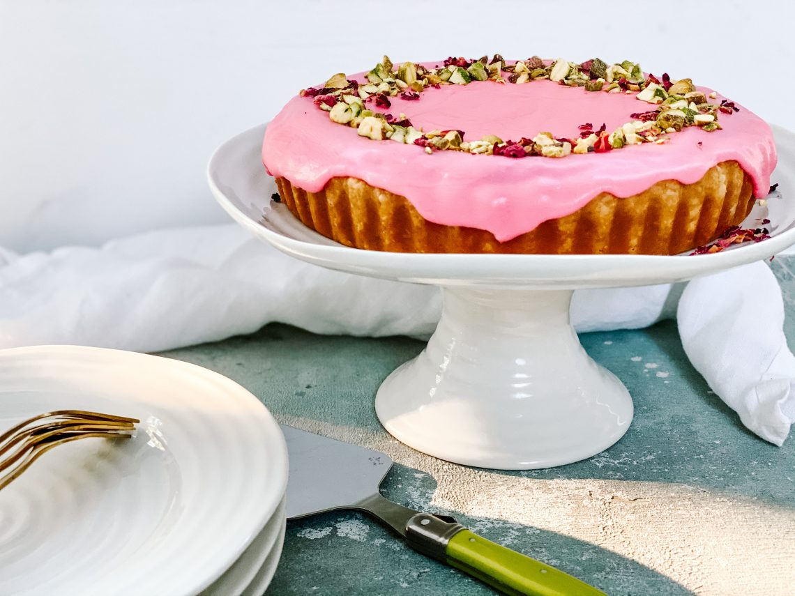 Photograph of Pistachio and Cherry Bakewell Tart with Pink Rose Water Icing