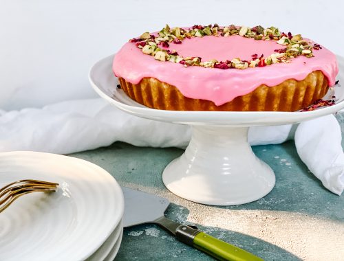 Photograph of Pistachio and Cherry Bakewell Tart with Pink Rose Water Icing