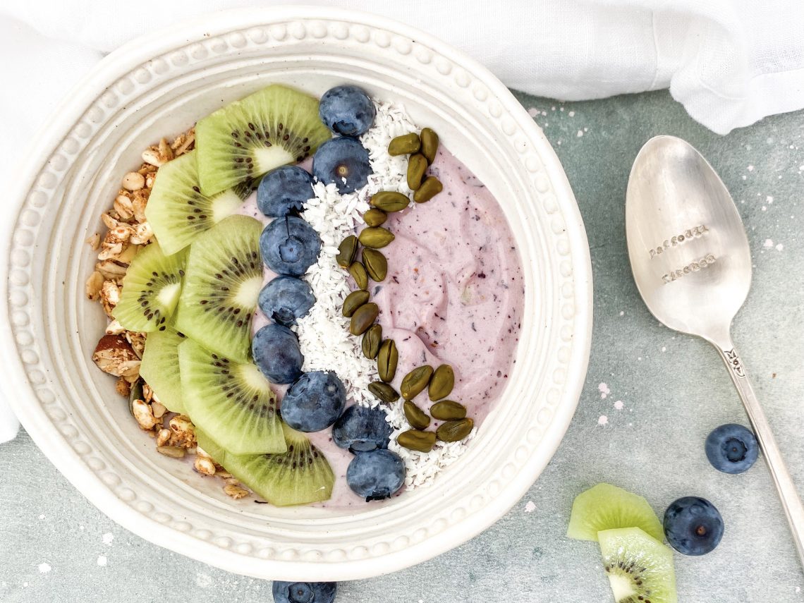 Photograph of Blueberry and Kiwi Smoothie Bowl with Banana, Coconut and Pistachios