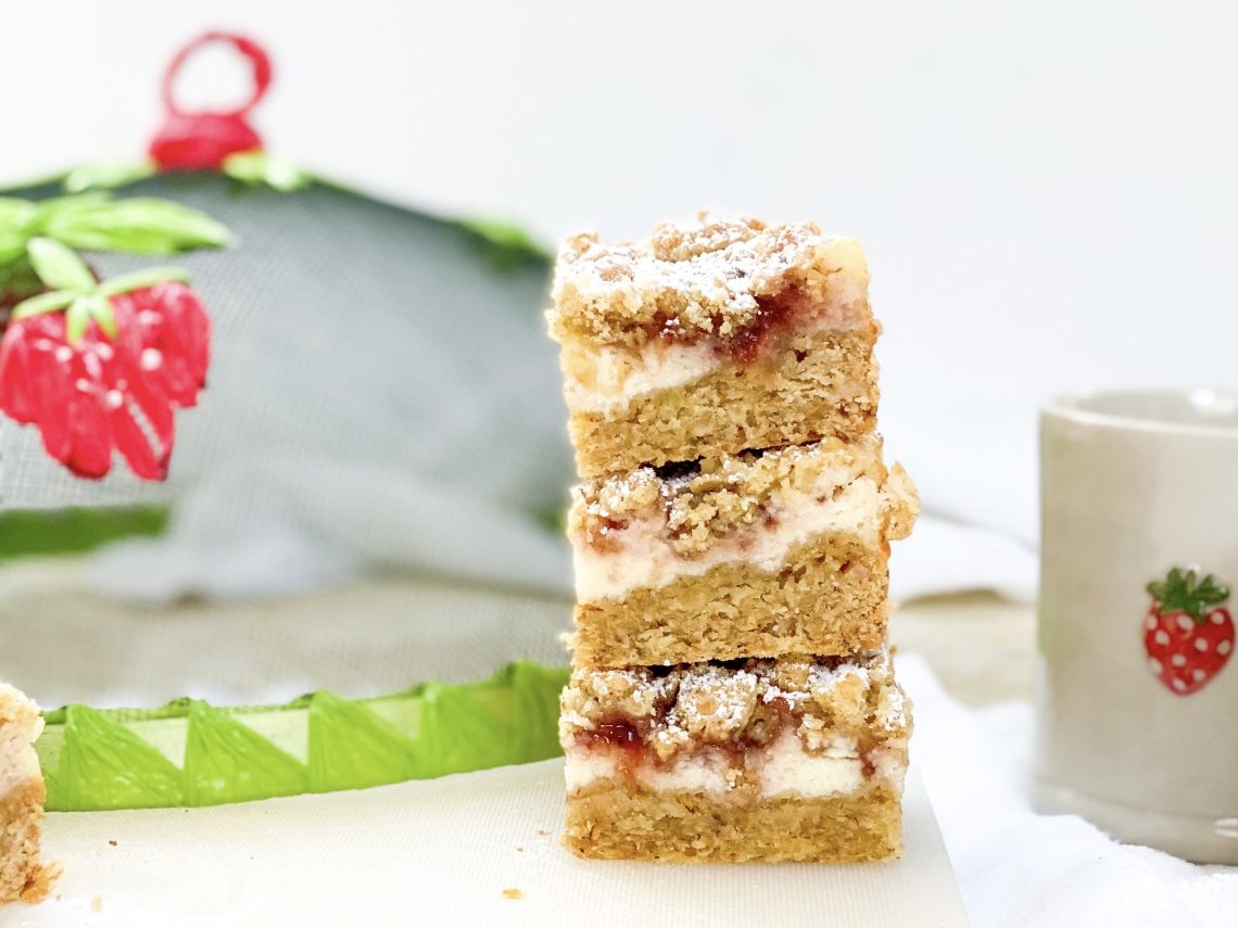 Photograph of Strawberries and Cream Oat Crumble Cheesecake Slices