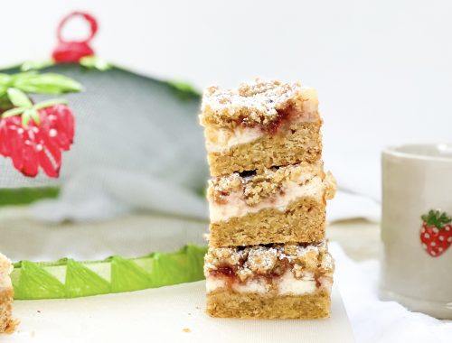 Photograph of Strawberries and Cream Oat Crumble Cheesecake Slices