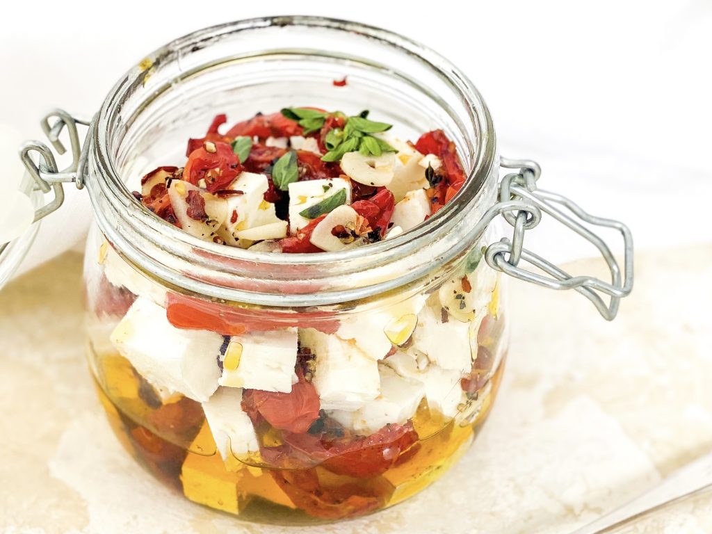 Photograph of Feta Cheese and Semi Dried Tomatoes Marinated in Olive Oil, Chilli, Garlic and Fresh Oregano