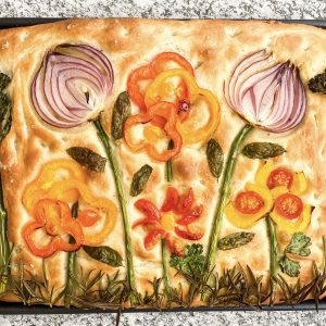 Photograph of Focaccia Bread with Vegetable and Herb Flowers