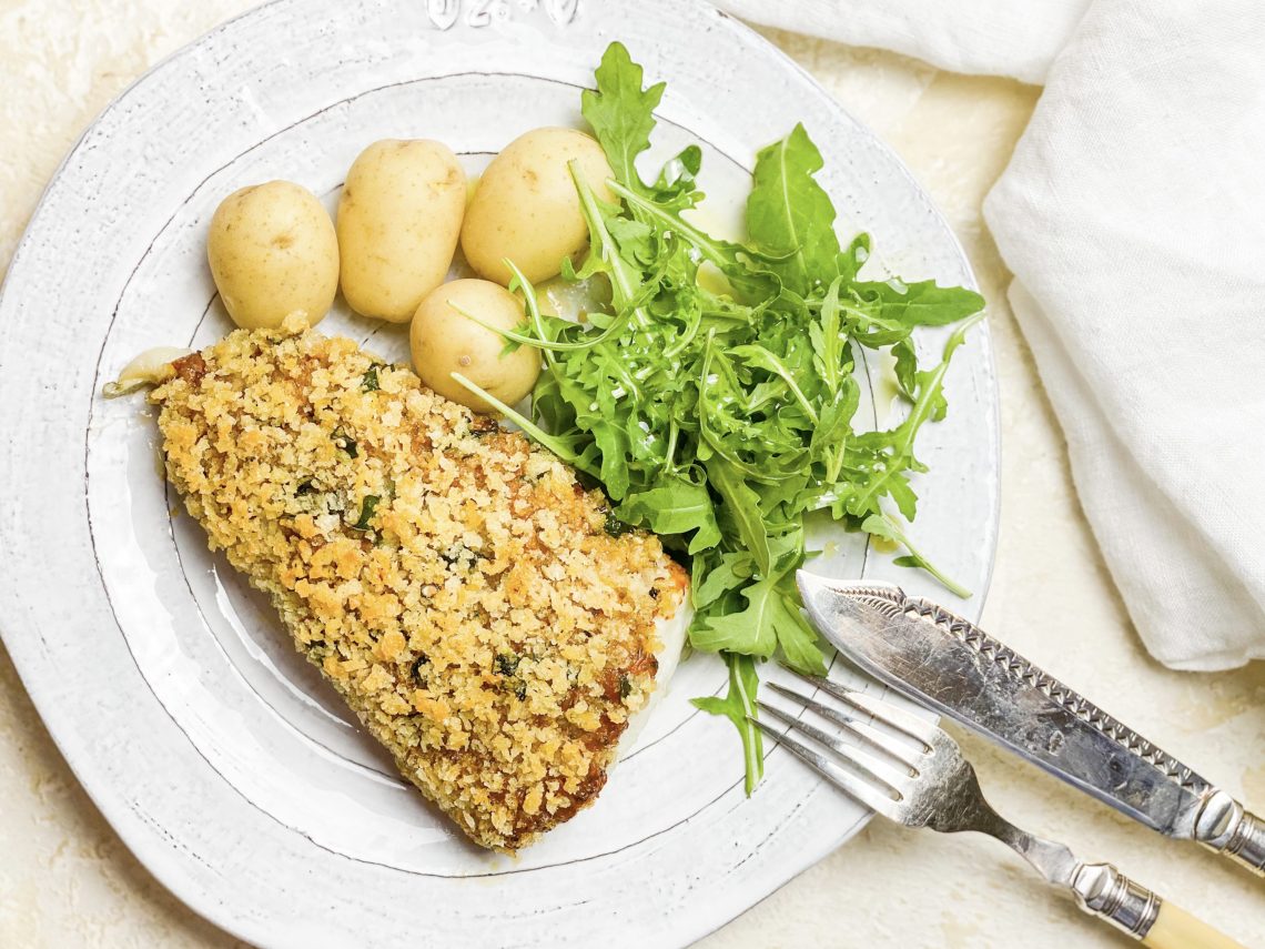 Photograph of Haddock with Semi-dried Tomato Pesto and a Crispy Lemon and Basil Breadcrumb Topping.