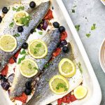 Oven-Baked Sea Bass with Red Onion, Red Pepper, Black Olives and Lemon