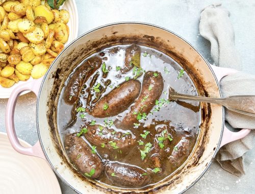 Photograph of Venison Sausage Casserole with Red Wine, Juniper Berries, Redcurrant Jelly and Fresh Thyme