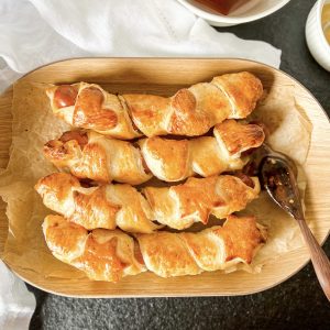 Photograph of Pastry Wrapped Frankfurter or 'Wienerli im Tieg'