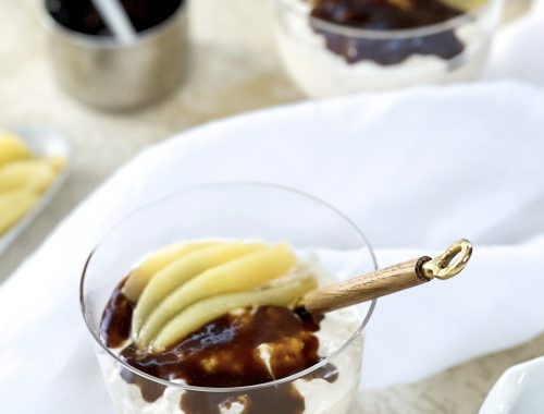 Photograph of Posh Rice Pudding with Salted Caramel Sauce, Poached Pears and Vanilla Syrup