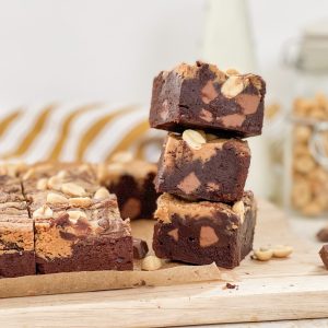 Photograph of Chocolate Chunk Peanut Butter Brownies with Salted Peanuts