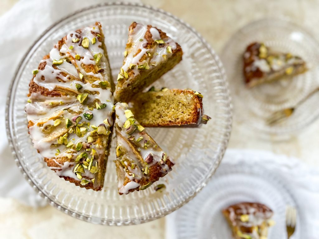 Photograph of Almond and Pistachio Cake with Pears, Lemon and Cardamom