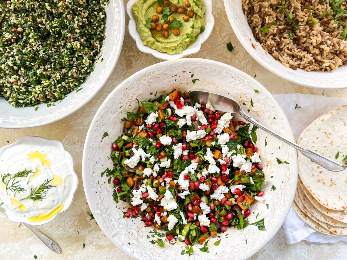 Photograph of Warm Sweet Potato and Chickpea Salad with Feta Cheese, Fresh Herbs and Pomegranate
