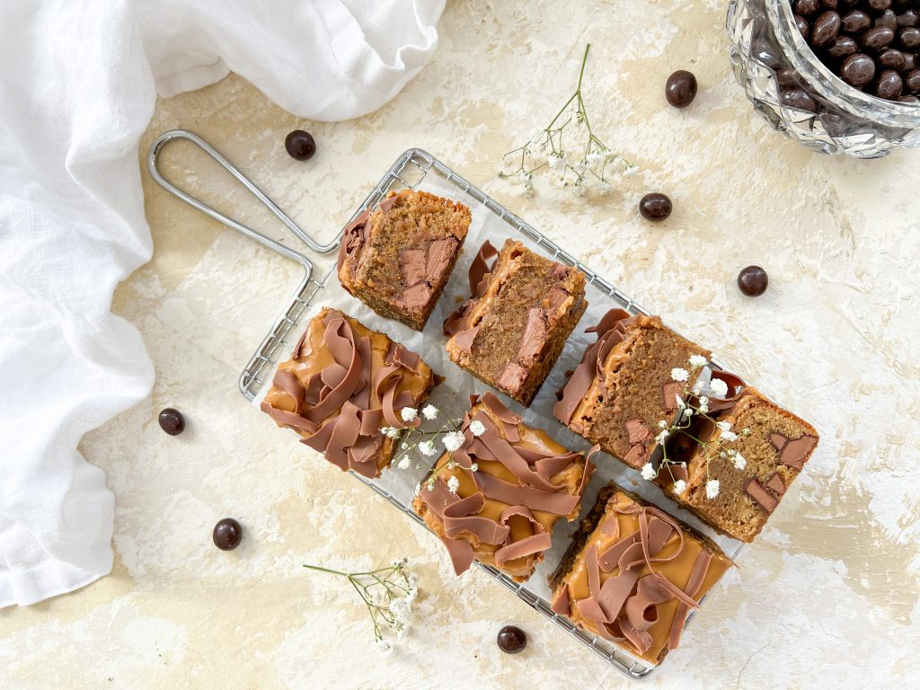 Photograph of Coffee Blondies with Chunks of Milk Chocolate and a Coffee Glaze