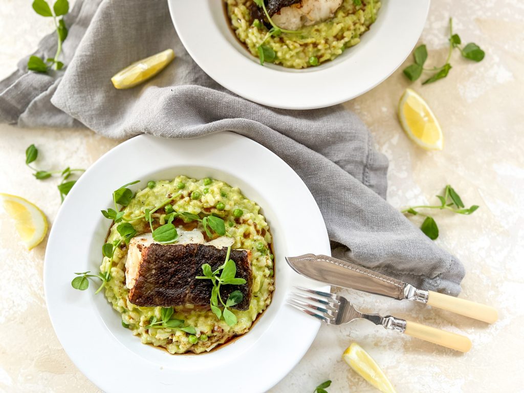 Photograph of Oven-Baked Fillet of Cod with Horseradish and Green Pea Risotto, drizzled in Nutty Brown Butter