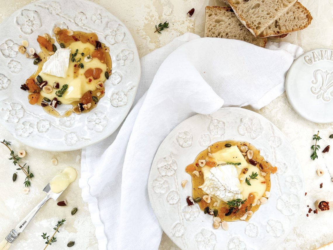 Photograph of Baked Camembert, Roast Pecans and Hazelnuts, Apricot, Chilli and Thyme Honey