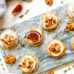 Photograph of Hot Goat’s Cheese Canapés with Fresh Figs and Chilli Spiked, Salted, Honeyed Walnuts