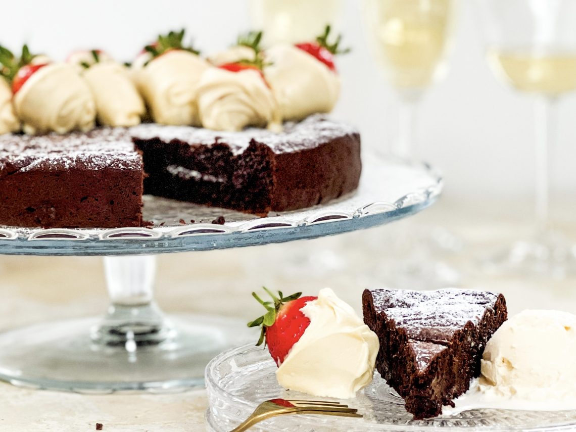 Photograph of Rich, Double Chocolate Cake with White Chocolate Dipped Strawberries