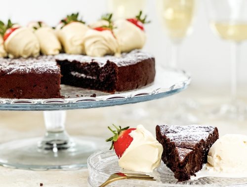 Photograph of Rich, Double Chocolate Cake with White Chocolate Dipped Strawberries