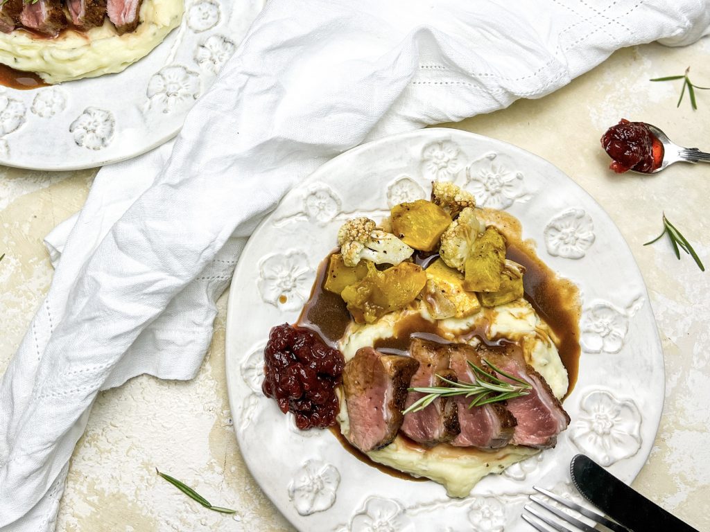 Photograph of Pan-fried Lamb Loin Fillet with a Rosemary Demi-Glace