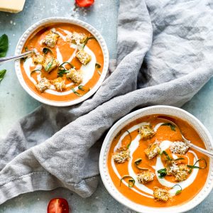 Photograph of Cream of Roast Tomato Soup with Sun-Dried Tomatoes and Parmesan Croutons