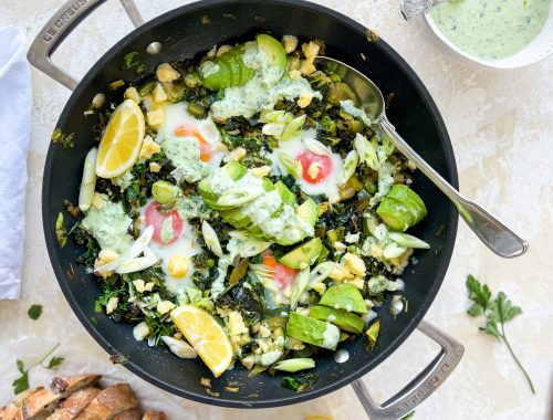 Photograph of Green Shakshuka with Leeks, Laverbread and `Caerphilly Cheese, Yoghurt with Green Chilli Oil