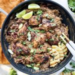 Photograph of Jerk Style Chicken served with Coconut Rice and Peas (Beans) and Grilled Pineapple