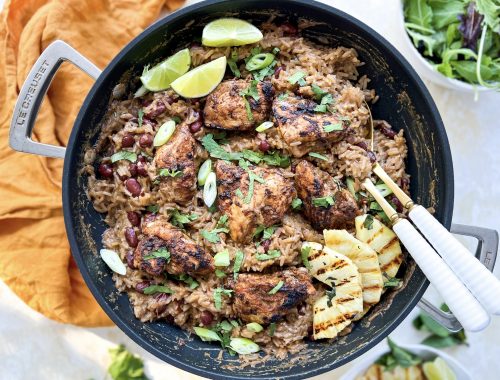 Photograph of Jerk Style Chicken served with Coconut Rice and Peas (Beans) and Grilled Pineapple