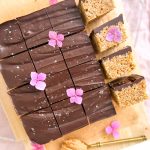 Photograph of Peanut Butter Rice Crispy Slice with Dark Chocolate and Sea Salt