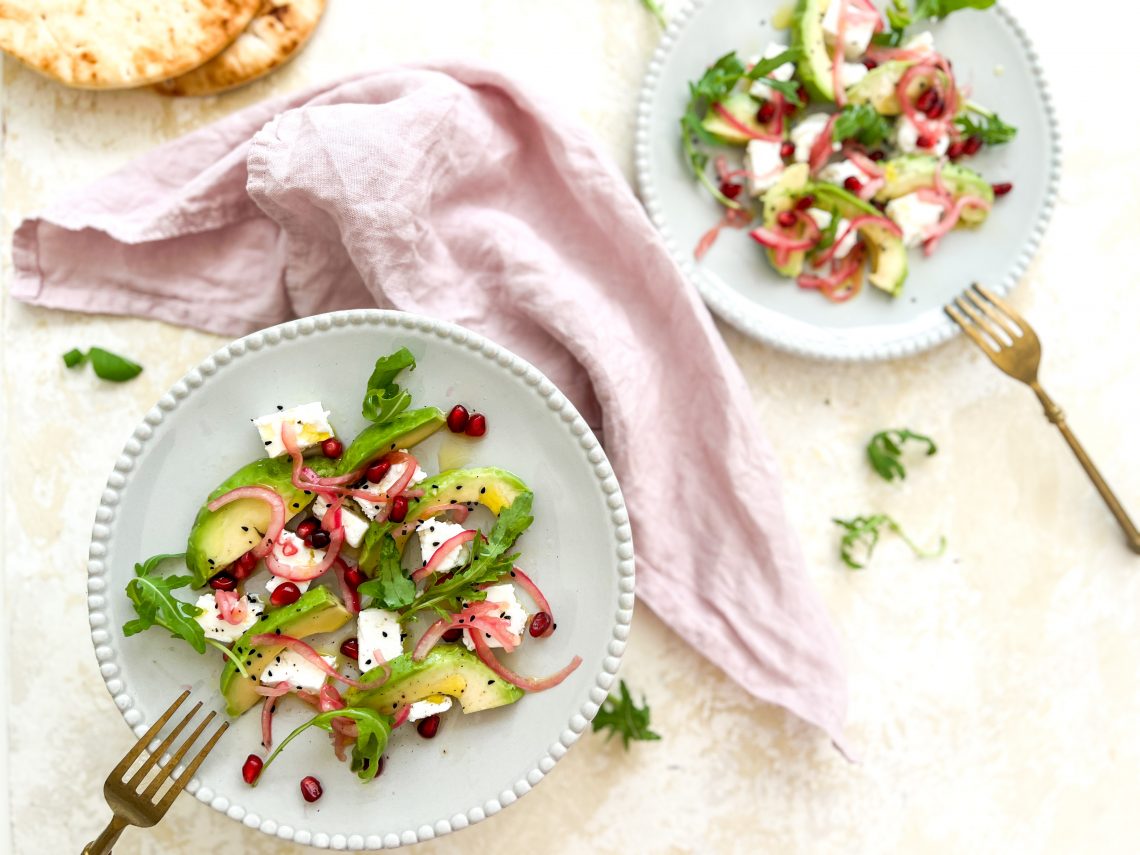 Photograph of Feta and Avocado Salad with Quick Pickled Red Onion and Pomegranate Seeds