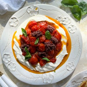 Photograph of Roasted Cherry Tomatoes, Black Olive Tapenade and Whipped Goat's Cheese Dip